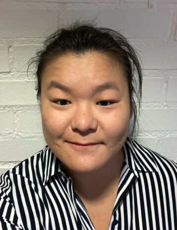 Porträttfoto av Kim Wang