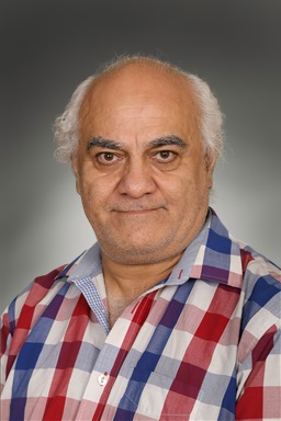 Porträttfoto av Nader Sani